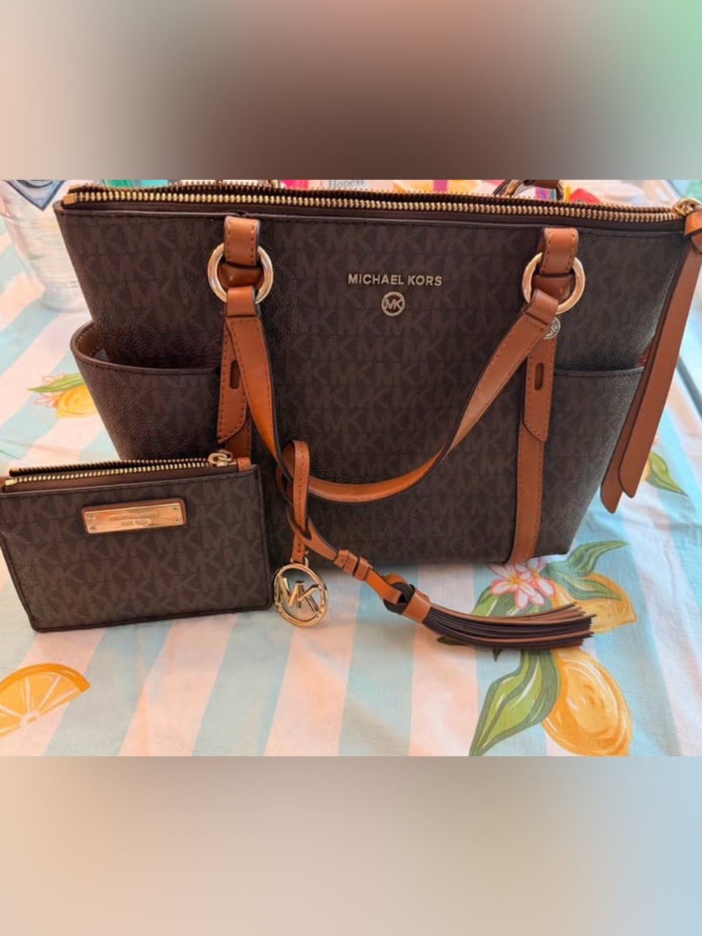 Michael Kors purse with matching wallet.